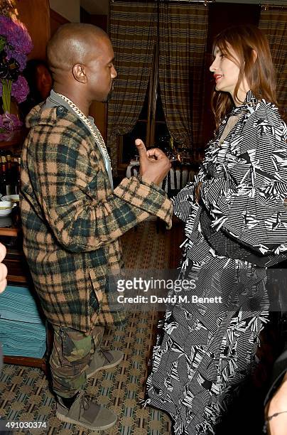 Kanye West and Roksanda Ilincic attend the Roksanda Ten Year Anniversary Dinner at Caviar Kaspia on October 2, 2015 in Paris, France.