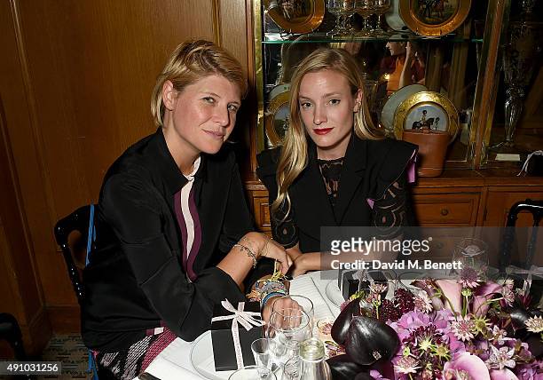 Elisa Nalin and Kate Foley attend the Roksanda Ten Year Anniversary Dinner at Caviar Kaspia on October 2, 2015 in Paris, France.