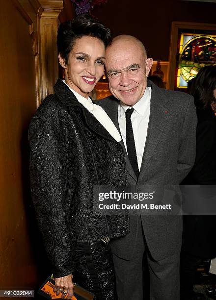 Farida Khelfa and Christian Lacroix attend the Roksanda Ten Year Anniversary Dinner at Caviar Kaspia on October 2, 2015 in Paris, France.