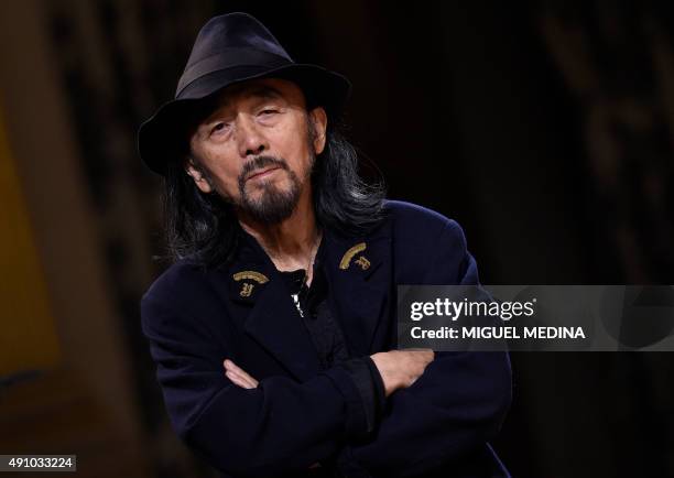 Japanese fashion designer Yohji Yamamoto looks on before his 2016 Spring/Summer ready-to-wear collection fashion show, on October 2, 2015 in Paris....