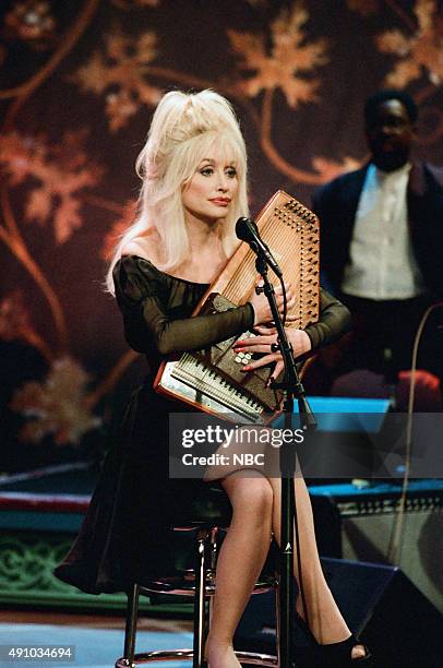 Episode 997 -- Pictured: Musical guest Dolly Parton performs on September 19, 1996 --