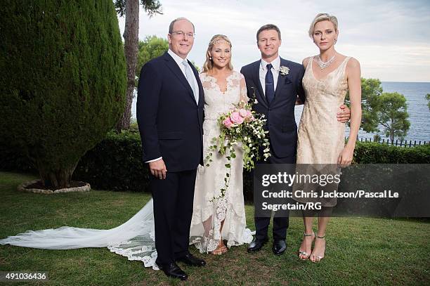 Prince Albert II of Monaco, Roisin Galvin Wittstock, Gareth Wittstock and Princess Charlene of Monaco pose after the wedding ceremony of Gareth...