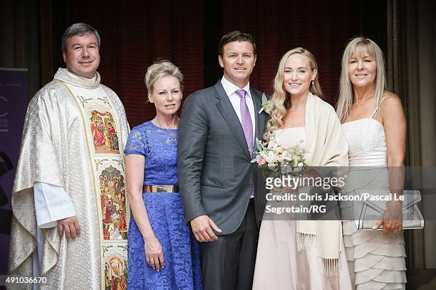 Father William McCandless, Lynette Wittstock, Gareth Wittstock, Roisin Galvin and Pauline Galvin attend the wedding ceremony of Gareth Wittstock and...