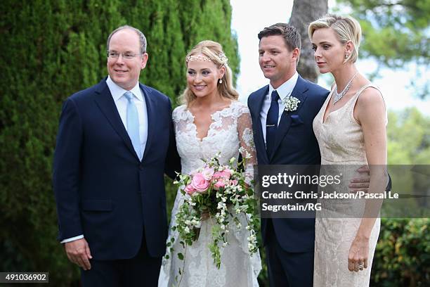 Prince Albert II of Monaco, Roisin Galvin Wittstock, Gareth Wittstock and Princess Charlene of Monaco pose after the wedding ceremony of Gareth...