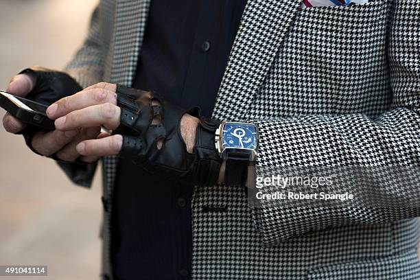 Guest wears Tag Heuer Monoco chronograph after Isabel Marant at Palais Royal during Paris Fashion Week Spring/Summer 2016 on October 2, 2015 in...