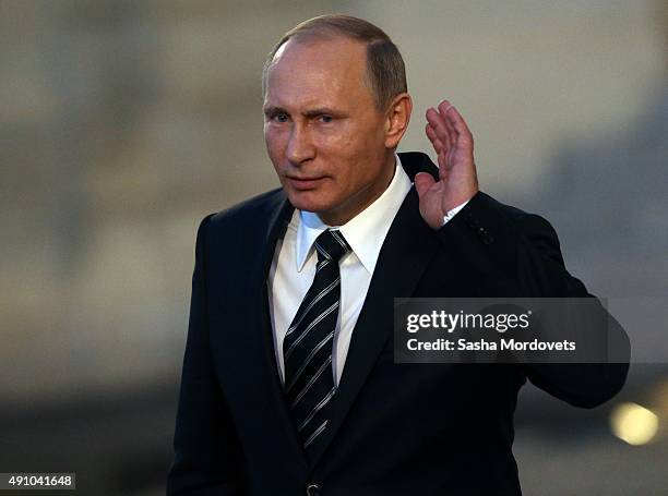 Russian President Vladimir Putin leaves the Elysee Palace on October 2, 2015 in Paris, France. Leaders of France, Germany, Russia and Ukraine has...