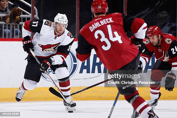 Dustin Jeffrey of the Arizona Coyotes white team skates with the puck during the Arizona Coyotes scrimmage game at Gila River Arena on September 24,...