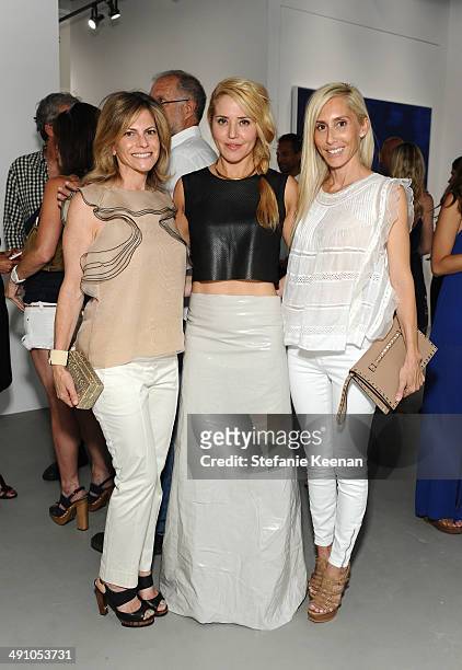 Allison Berg, artist Stephanie Hirsch, and Alexandra von Furstenberg attend the grand opening of De Re Gallery on May 15, 2014 in West Hollywood, CA.