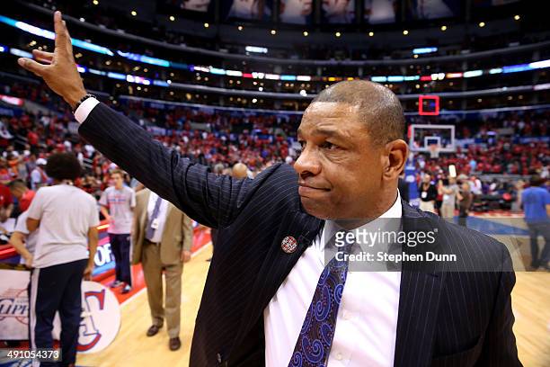 Head coach Doc Rivers of the Los Angeles Clippers waves to fans after the Clippers were eliminated by the Oklahoma City Thunder in Game Six of the...