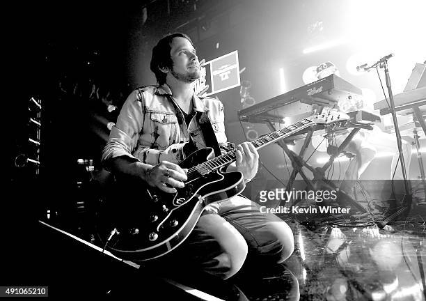 Musician Brian Aubert of Silversun Pickups performs onstage during the celebration their album release with an exclusive performance at the...
