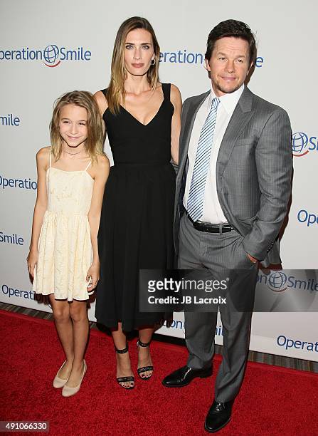 Ella Rae Wahlberg, Rhea Durham and Mark Wahlberg attend Operation Smile's 2015 Smile Gala event held at The Beverly Wilshire Four Seasons Hotel on...