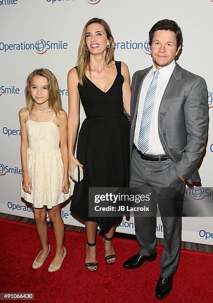 Ella Rae Wahlberg, Rhea Durham and Mark Wahlberg attend Operation Smile's 2015 Smile Gala event held at The Beverly Wilshire Four Seasons Hotel on...