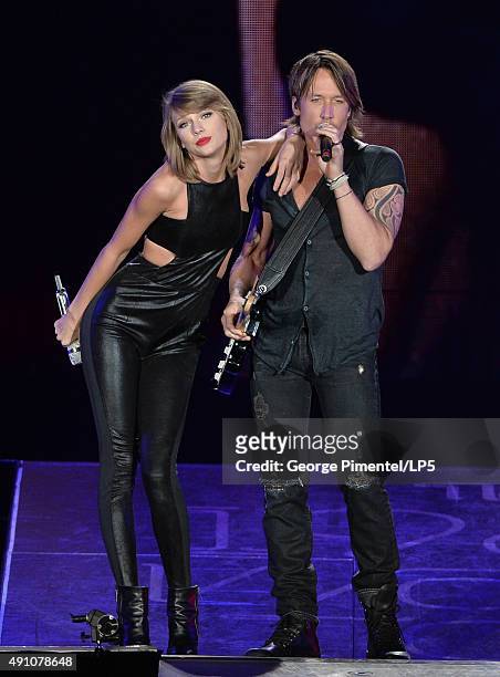 Singer/songwriters Taylor Swift and Keith Urban perform onstage during The 1989 World Tour live in Toronto at Rogers Center on October 2, 2015 in...