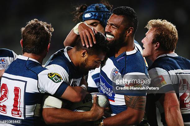 George Moala of Auckland celebrates after scoring a try with Lolagi Visinia of Auckland during the round eight ITM Cup match between Auckland and...