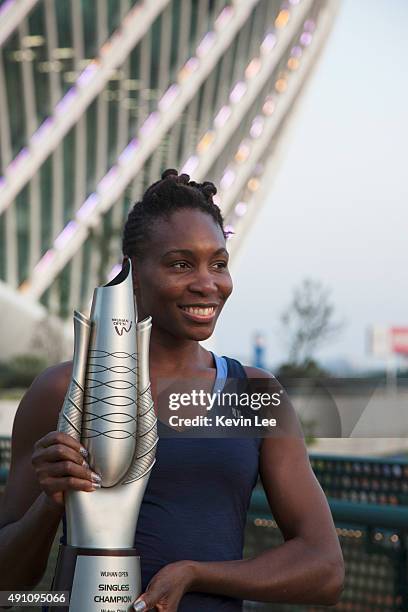 Venus Williams of United States poses with the trophy outside the venue after winning the final against Garbine Muguruza of Spain on day 7 of 2015...