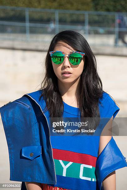 Fashion Blogger Yuwei Zhangzou Yuyu wears all CJ Yao, and Gentle Monster sunglasses on day 4 during Paris Fashion Week Spring/Summer 2016 on October...