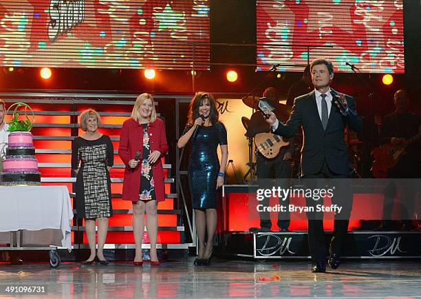 Clark County Commissioner Susan Brager and Flamingo Las Vegas Regional President Eileen Moore present entertainers Marie Osmond and Donny Osmond a...