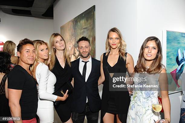 John Tew, Charlotte Mckinny, Michelle Bof, Mike Segato, and Marine Tanguy attend the grand opening of De Re Gallery on May 15, 2014 in West...