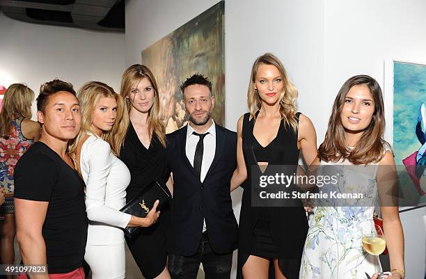John Tew, Charlotte Mckinny, Michelle Bof, Mike Segato, and Marine Tanguy attend the grand opening of De Re Gallery on May 15, 2014 in West...