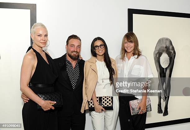 Stacey Bowen, Brian Bowen Smith, Demi Moore, and Shae Bowen-Smith attend the grand opening of De Re Gallery on May 15, 2014 in West Hollywood, CA.