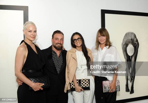 Stacey Bowen, Brian Bowen Smith, Demi Moore, and Shae Bowen-Smith attend the grand opening of De Re Gallery on May 15, 2014 in West Hollywood, CA.
