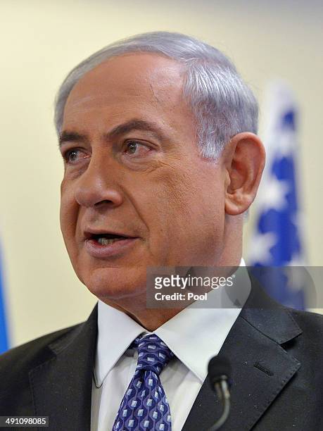 Israeli Prime Minister Benjamin Netanyahu speaks to the press ahead of a meeting with US Defense Secretary Chuck Hagel at his office on May 16, 2014...