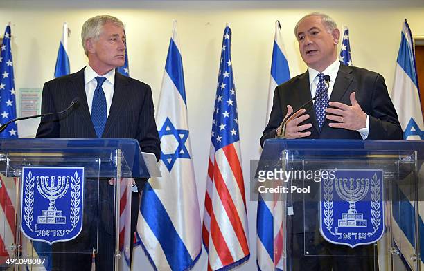 Israeli Prime Minister Benjamin Netanyahu speaks to the press ahead of a meeting with US Defense Secretary Chuck Hagel at the prime minister's...