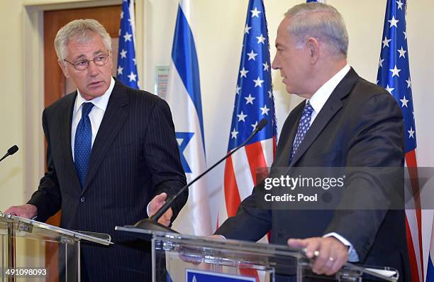 Defense Secretary Chuck Hagel speaks to the press ahead of a meeting with Israeli Prime Minister Benjamin Netanyahu at the prime minister's office on...