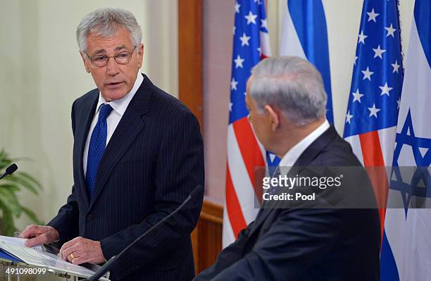 Defense Secretary Chuck Hagel speaks to the press ahead of a meeting with Israeli Prime Minister Benjamin Netanyahu at the prime minister's office on...