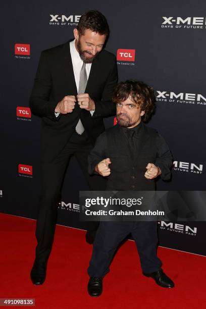 Hugh Jackman and Peter Dinklage pose as they arrive at the Australian premiere of 'X-Men: Days of Future Past" on May 16, 2014 in Melbourne,...