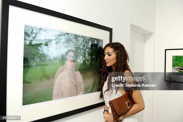 Guest attends the grand opening of De Re Gallery on May 15, 2014 in West Hollywood, CA.