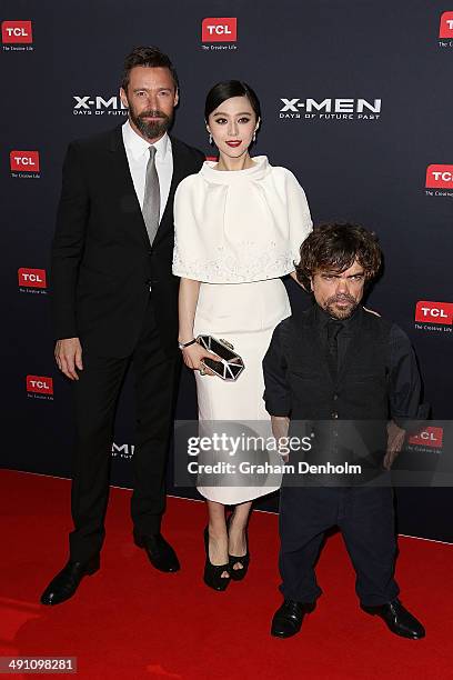 Hugh Jackman, Fan Bingbing and Peter Dinklage pose as they arrive at the Australian premiere of 'X-Men: Days of Future Past" on May 16, 2014 in...