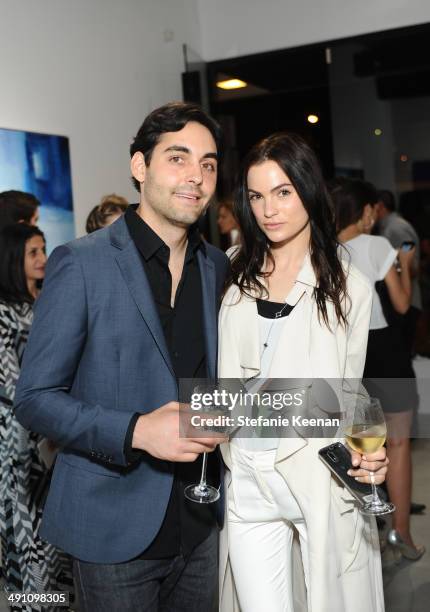 Guests attend the grand opening of De Re Gallery on May 15, 2014 in West Hollywood, CA.