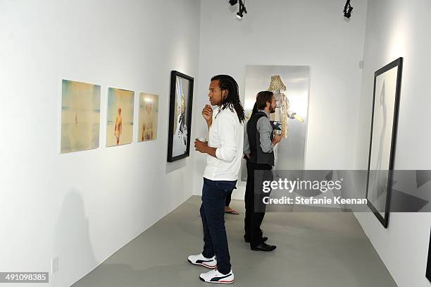 Guests attend the grand opening of De Re Gallery on May 15, 2014 in West Hollywood, CA.