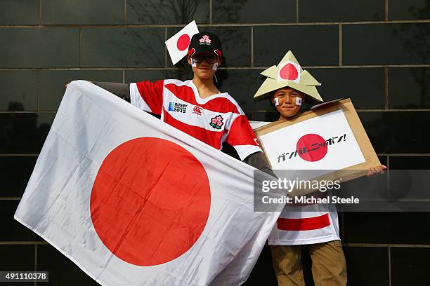 Japan fans pose outside the ground prior to the 2015 Rugby World Cup Pool B match between Samoa and Japan at Stadium mk on October 3, 2015 in Milton...