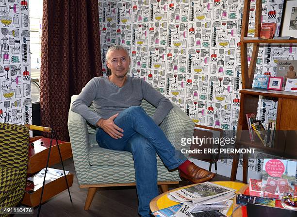 Elegancia Hotels co-founder and CEO Philippe Vaurs poses in one of his hotels in Paris on September 23, 2015. AFP PHOTO / ERIC PIERMONT