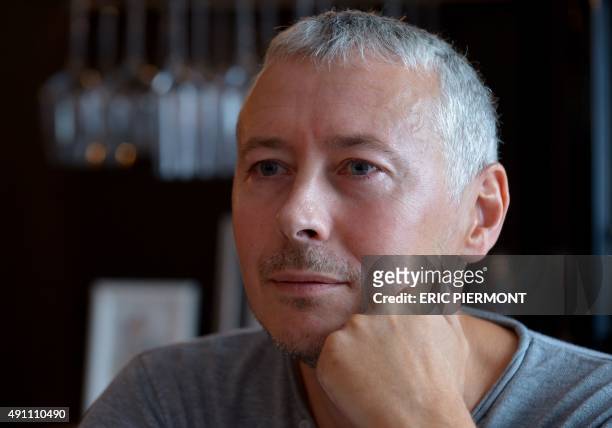 Elegancia Hotels co-founder and CEO Philippe Vaurs poses in one of his hotels in Paris on September 23, 2015. AFP PHOTO / ERIC PIERMONT / AFP PHOTO /...