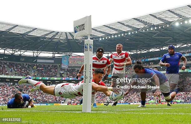 Akihito Yamada of Japan scores his teams second try during the 2015 Rugby World Cup Pool B match between Samoa and Japan at Stadium mk on October 3,...
