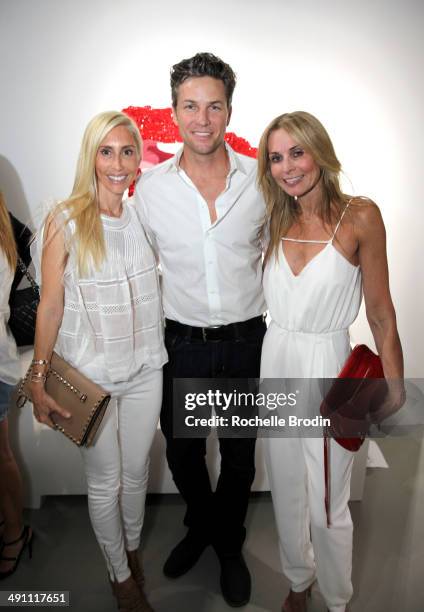 Alexandra von Furstenberg, Dax Miller, and guest attend the grand opening of De Re Gallery on May 15, 2014 in West Hollywood, CA.