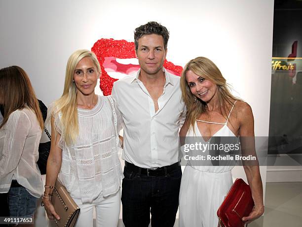 Alexandra von Furstenberg, Dax Miller, and guest attend the grand opening of De Re Gallery on May 15, 2014 in West Hollywood, CA.
