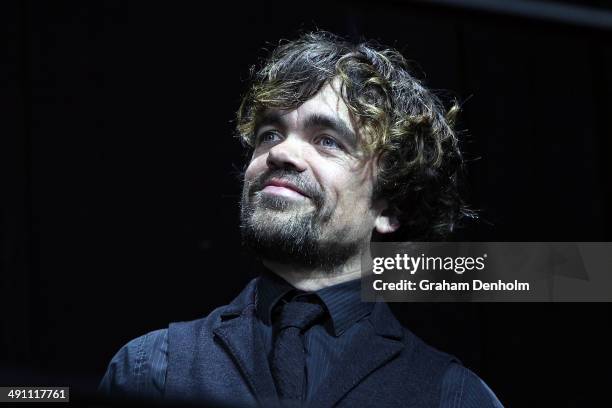 Peter Dinklages poses as he arrives at the Australian premiere of 'X-Men: Days of Future Past" on May 16, 2014 in Melbourne, Australia.