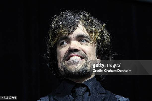 Peter Dinklages poses as he arrives at the Australian premiere of 'X-Men: Days of Future Past" on May 16, 2014 in Melbourne, Australia.