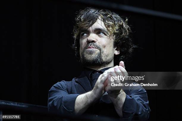 Peter Dinklages poses as he arrives at the Australian premiere of 'X-Men: Days of Future Past" on May 16, 2014 in Melbourne, Australia.