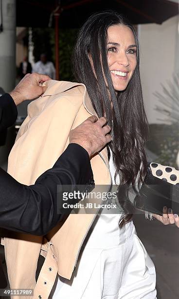 Demi Moore attends the grand opening of the De Re Gallery on May 15, 2014 in West Hollywood, California.