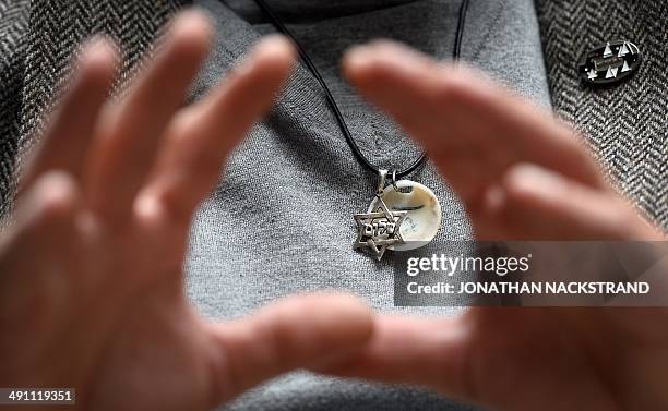 Rainer Hoess, the grandson of Rudolf Hoess, the Nazi commandant of the Auschwitz concentration and extermination camp, wears a star of david...