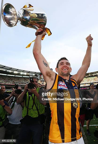 Luke Hodge of the Hawks celebrates the win with the cup during the 2015 AFL Grand Final match between the Hawthorn Hawks and the West Coast Eagles at...