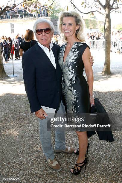 Jean-Daniel Lorieux and his companion Laura Restelli attend the Elie Saab show as part of the Paris Fashion Week Womenswear Spring/Summer 2016 on...