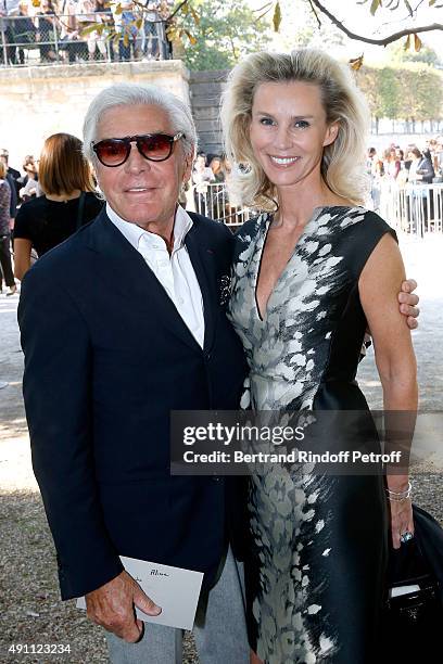 Jean-Daniel Lorieux and his companion Laura Restelli attend the Elie Saab show as part of the Paris Fashion Week Womenswear Spring/Summer 2016 on...