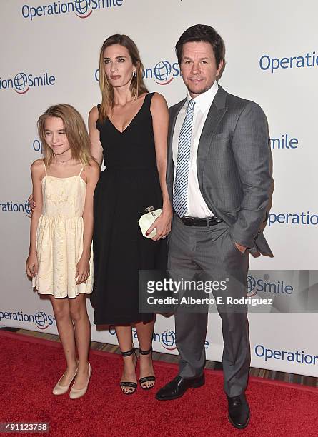Ella Rae Wahlberg, from left, Rhea Durham and actor Mark Wahlberg attend Operation Smile's 2015 Smile Gala at the Beverly Wilshire Four Seasons Hotel...