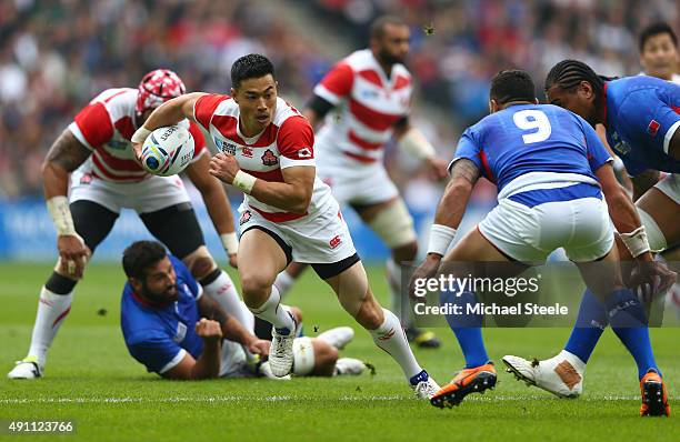 Akihito Yamada of Japan breaks during the 2015 Rugby World Cup Pool B match between Samoa and Japan at Stadium mk on October 3, 2015 in Milton...